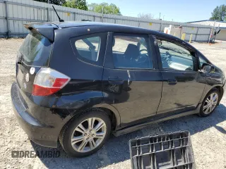 2011 Honda Fit Sport with VIN JHMGE8H57BC024827, listed as a Copart auction lot 59704194 with 146,316 mi miles and Salvage Title. Bid and sale history available at DreamBid. Image 3.