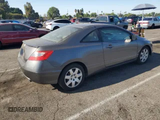 2010 Honda Civic Cpe LX with VIN 2HGFG1B61AH529839, listed as a Copart auction lot 69501724 with 218,443 mi miles and Salvage Title. Bid and sale history available at carsss.com. Image 3.