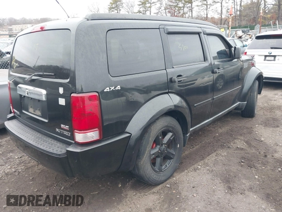 2009 Dodge Nitro SLT with VIN 1D8GU58K19W525618, listed as a IAAI auction lot 41726192 with 999,999 mi miles. Bid and sale history available at carsss.com. Image 4.