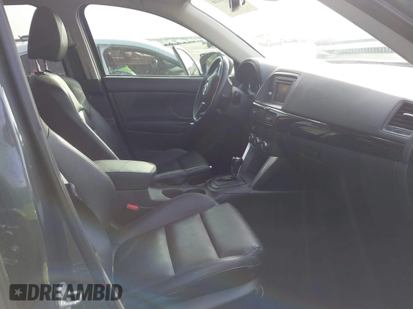 2014 Mazda CX-5 Grand Touring with VIN JM3KE2DY7E0345742, listed as a IAAI auction lot 41864116 with 158,746 mi miles. Bid and sale history available at carsss.com. Image 5.