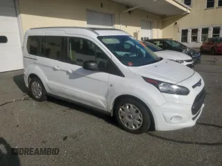 2015 Ford Transit Connect XLT with VIN NM0AE8F77F1202312, listed as a Copart auction lot 87724125 with 100,463 mi miles and Salvage title. Bid and sale history available at DreamBid. Image 4.
