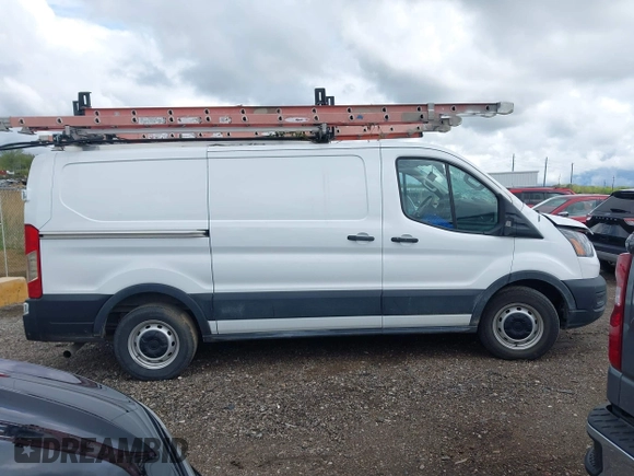 2021 Ford Transit Cargo z VIN 1FTYE1Y86MKA71783, wystawiony jako IAAI lot #42183454 z przebiegiem 53 405 mil mil oraz . Historia ofert i sprzedaży dostępna na DreamBid. Obrazek 13.