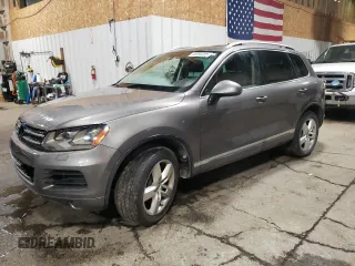 2012 Volkswagen Touareg Sport z VIN WVGFK9BP0CD001175, wystawiony jako Copart lot #46390205 z przebiegiem 132 793 mil mil oraz Czysty tytuł • Clean title. Historia ofert i sprzedaży dostępna na DreamBid. Obrazek 1.