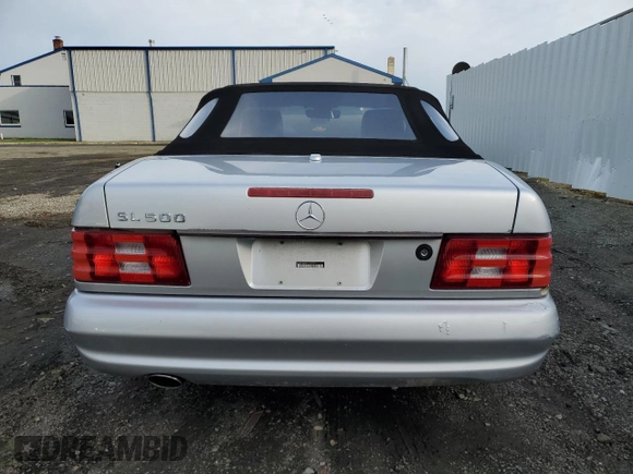 2001 Mercedes-Benz SL 500 with VIN WDBFA68F31F196516, listed as a Copart auction lot 50635005 with 61,682 mi miles and Salvage title. Bid and sale history available at DreamBid. Image 6.