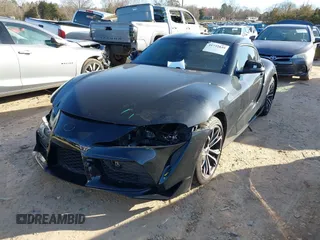 2021 Toyota GR Supra 2.0 with VIN WZ1DB2C09MW043680, listed as a IAAI auction lot 41732849 with 36,821 mi miles. Bid and sale history available at carsss.com. Image 2.
