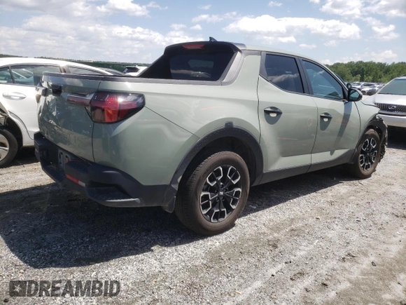 2023 Hyundai Santa Cruz SEL with VIN 5NTJBDAE9PH054993, listed as a Copart auction lot 57294935 with 46,527 mi miles and Salvage title. Bid and sale history available at DreamBid. Image 3.