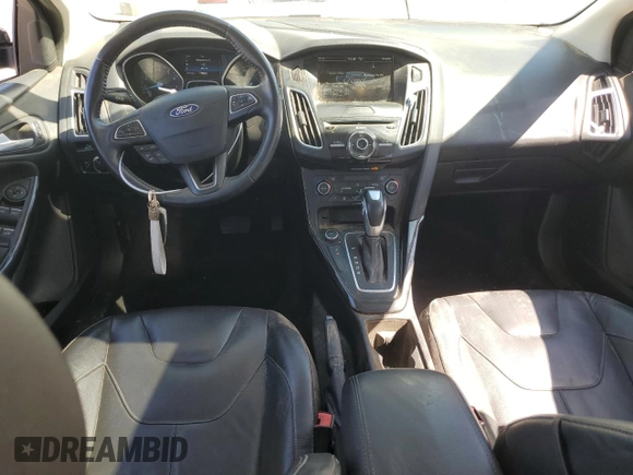 2015 Ford Focus Titanium with VIN 1FADP3J23FL300126, listed as a Copart auction lot 54434165 with 176,526 mi miles and Salvage title. Bid and sale history available at DreamBid. Image 8.