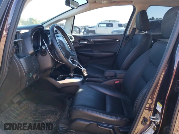 2016 Honda Fit EX-L with VIN JHMGK5H82GS014561, listed as a Copart auction lot 46746815 with 77,525 mi miles and Salvage title. Bid and sale history available at DreamBid. Image 7.