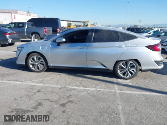 2019 Honda Clarity Touring z VIN JHMZC5F38KC003399, wystawiony jako IAAI lot #41818175 z przebiegiem 54 896 mil mil oraz . Historia ofert i sprzedaży dostępna na DreamBid. Obrazek 14.