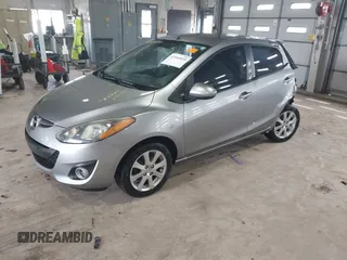 2012 Mazda 2 Touring with VIN JM1DE1LY8C0140439, listed as a IAAI auction lot 41866835 with 122,512 mi miles. Bid and sale history available at carsss.com. Image 2.