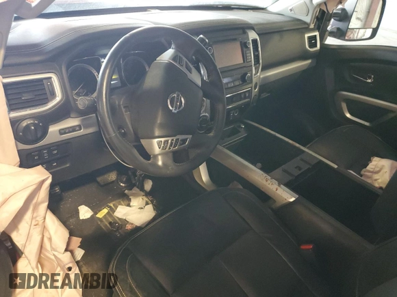 2017 Nissan Titan Platinum Reserve with VIN 1N6AA1E52HN501110, listed as a Copart auction lot 48202935 with 83,674 mi miles and Salvage title. Bid and sale history available at DreamBid. Image 8.