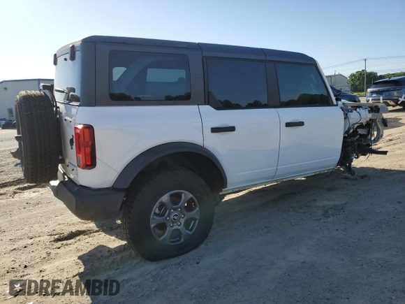 2023 Ford Bronco z VIN 1FMEE5BP7PLC16799, wystawiony jako Copart lot #57847955 z przebiegiem 11 980 mil mil oraz Czysty tytuł • Clean title. Historia ofert i sprzedaży dostępna na DreamBid. Obrazek 3.