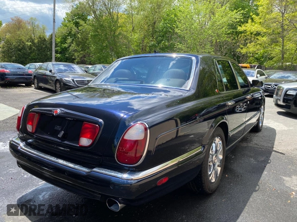 2002 Bentley Arnage with VIN SCBLC31E62CX08029, listed as a Copart auction lot 57389945 with 86,082 mi miles and Clean Title. Bid and sale history available at DreamBid. Image 4.