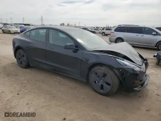2023 Tesla Model 3 with VIN 5YJ3E1EA5PF421598, listed as a Copart auction lot 47036995 with 6,511 mi miles and Salvage Title. Bid and sale history available at carsss.com. Image 4.