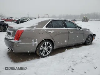 2014 Cadillac CTS Vsport Premium RWD z VIN 1G6AV5S8XE0163433, wystawiony jako Copart lot #85983944 z przebiegiem 31 821 mil mil oraz Szkody całkowita. Historia ofert i sprzedaży dostępna na DreamBid. Obrazek 3.