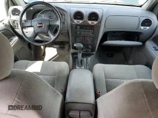 2005 GMC Envoy SLT with VIN 1GKDT13S952144349, listed as a Copart auction lot 71800694 with 137,614 mi miles and Salvage Title. Bid and sale history available at DreamBid. Image 8.