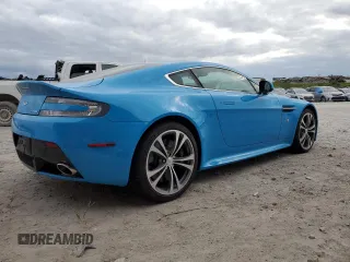 2011 Aston Martin V12 Vantage Carbon Black with VIN SCFEBBCF6BGS00579, listed as a Copart auction lot 79911294 with 34,191 mi miles and Salvage Title. Bid and sale history available at carsss.com. Image 3.