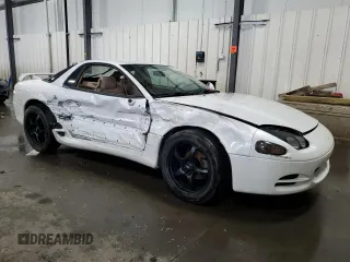 1996 Mitsubishi 3000GT GT z VIN JA3AM84J5TY002387, wystawiony jako Copart lot #64983534 z przebiegiem 149 380 mil mil oraz Szkody całkowita. Historia ofert i sprzedaży dostępna na DreamBid. Obrazek 4.