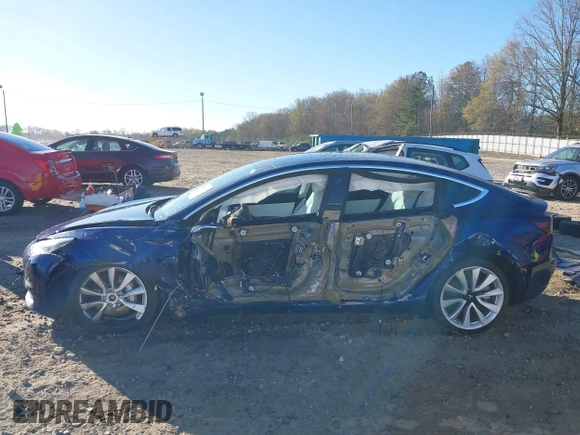 2019 Tesla Model 3 Long Range with VIN 5YJ3E1EB7KF454636, listed as a IAAI auction lot 41853972 with 56,916 mi miles. Bid and sale history available at carsss.com. Image 15.