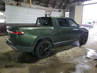 2023 Rivian R1T Adventure with VIN 7FCTGAAA0PN024165, listed as a Copart auction lot 84265444 with Not Provided miles and Salvage Title. Bid and sale history available at carsss.com. Image 3.