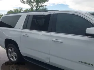2018 Chevrolet Suburban LT with VIN 1GNSCHKC2JR376239, listed as a IAAI auction lot 42110551 with 123,694 mi miles and . Bid and sale history available at DreamBid. Image 6.