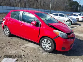 2014 Toyota Yaris L with VIN JTDKTUD33ED576046, listed as a IAAI auction lot 41378859 with 217,721 mi miles. Bid and sale history available at carsss.com. Image 1.