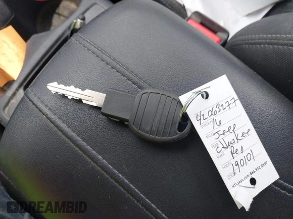 2016 Jeep Cherokee Sport with VIN 1C4PJLAB4GW190101, listed as a IAAI auction lot 42063277 with 61,868 mi miles. Bid and sale history available at carsss.com. Image 11.