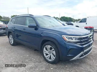 2023 Volkswagen Atlas SE z VIN 1V2JR2CA0PC506705, wystawiony jako IAAI lot #42013473 z przebiegiem 8 311 mil mil oraz . Historia ofert i sprzedaży dostępna na DreamBid. Obrazek 1.