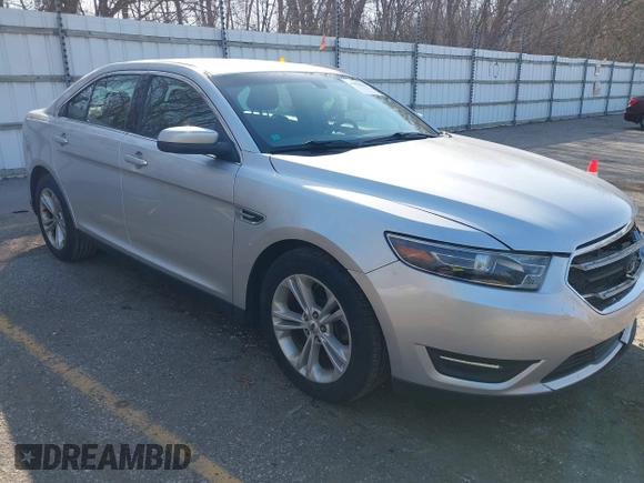 2013 Ford Taurus SEL with VIN 1FAHP2E8XDG191132, listed as a IAAI auction lot 41833542 with 165,125 mi miles. Bid and sale history available at carsss.com. Image 1.