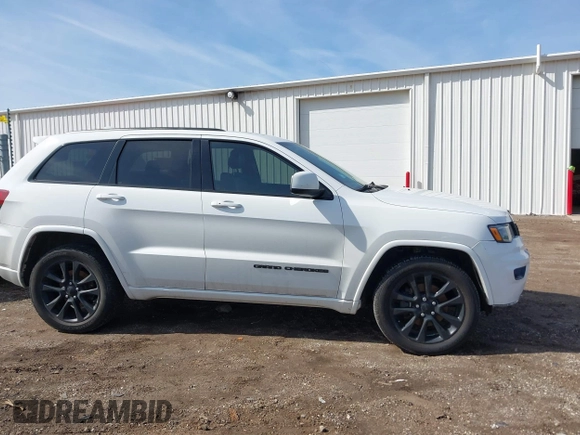 2017 Jeep Grand Cherokee Altitude with VIN 1C4RJFAG8HC768449, listed as a IAAI auction lot 41777272 with 72,913 mi miles and . Bid and sale history available at DreamBid. Image 13.