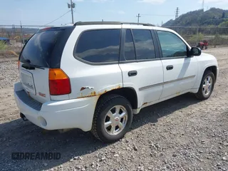 2008 GMC Envoy SLE2 with VIN 1GKDT13S682112642, listed as a IAAI auction lot 42062008 with 162,467 mi miles. Bid and sale history available at carsss.com. Image 4.