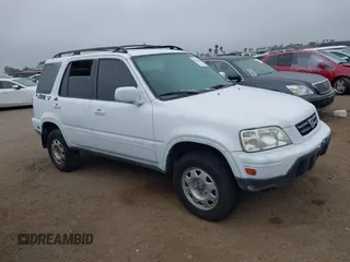 2001 Honda CR-V LX z VIN JHLRD28441S007072, wystawiony jako IAAI lot #42403505 z przebiegiem 235 261 mil mil oraz . Historia ofert i sprzedaży dostępna na DreamBid. Obrazek 1.