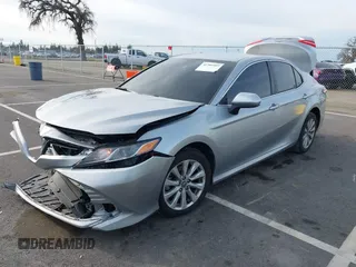 2019 Toyota Camry LE with VIN 4T1B11HK7KU803624, listed as a IAAI auction lot 41589107 with 169,863 mi miles and . Bid and sale history available at DreamBid. Image 2.