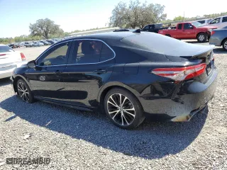 2019 Toyota Camry LE with VIN 4T1B11HK5KU257695, listed as a Copart auction lot 48740455 with 173,080 mi miles and Clean Title. Bid and sale history available at carsss.com. Image 2.