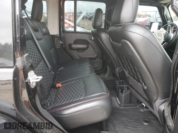 2021 Jeep Wrangler Unlimited Rubicon z VIN 1C4HJXFN1MW793064, wystawiony jako Copart lot #55643305 z przebiegiem 51 944 mil mil oraz Szkoda całkowita • Salvage title. Historia ofert i sprzedaży dostępna na DreamBid. Obrazek 10.
