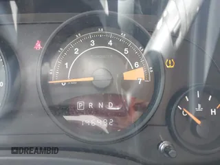 2016 Jeep Patriot Latitude with VIN 1C4NJRFB7GD658594, listed as a IAAI auction lot 42066483 with 146,492 mi miles. Bid and sale history available at carsss.com. Image 15.