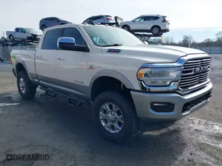 2022 Ram 2500 Laramie with VIN 3C6UR5FLXNG105323, listed as a IAAI auction lot 41359667 with 33,266 mi miles. Bid and sale history available at carsss.com. Image 1.