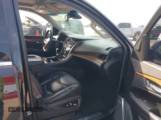 2015 Cadillac Escalade Luxury z VIN 1GYS4BKJ6FR291441, wystawiony jako IAAI lot #41881022 z przebiegiem 128 659 mil mil oraz . Historia ofert i sprzedaży dostępna na DreamBid. Obrazek 5.
