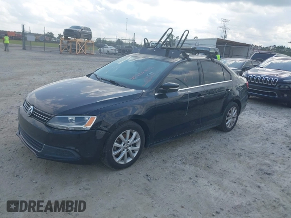2013 Volkswagen Jetta SE with VIN 3VWDX7AJ9DM308054, listed as a IAAI auction lot 41726950 with 219,711 mi miles and . Bid and sale history available at DreamBid. Image 2.