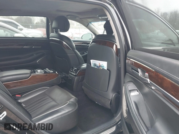 2018 Genesis G90 3.3T Premium with VIN KMHG34JA7JU041008, listed as a IAAI auction lot 41719369 with 146,874 mi miles. Bid and sale history available at carsss.com. Image 8.