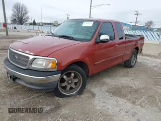 2001 Ford F-150 XL z VIN 1FTRX17W61NA63398, wystawiony jako IAAI lot #41882852 z przebiegiem 179 573 mil mil oraz . Historia ofert i sprzedaży dostępna na DreamBid. Obrazek 2.