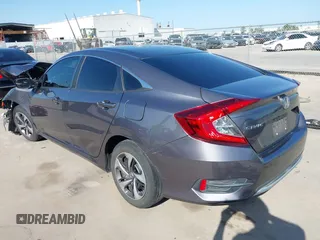 2020 Honda Civic LX z VIN 19XFC2F68LE023059, wystawiony jako IAAI lot #41856327 z przebiegiem 84 499 mil mil oraz . Historia ofert i sprzedaży dostępna na DreamBid. Obrazek 3.