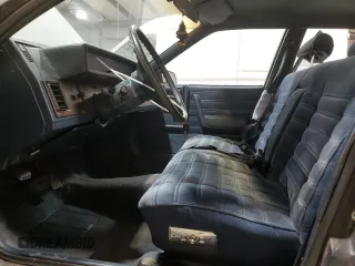 1985 Chevrolet Celebrity z VIN 2G1AW19X2F1138184, wystawiony jako Copart lot #82756234 z przebiegiem 11 872 mil mil oraz Tytuł czysty. Historia ofert i sprzedaży dostępna na DreamBid. Obrazek 7.