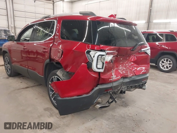 2023 GMC Acadia SLT with VIN 1GKKNULS2PZ220880, listed as a IAAI auction lot 42104702 with 33,536 mi miles and . Bid and sale history available at DreamBid. Image 6.