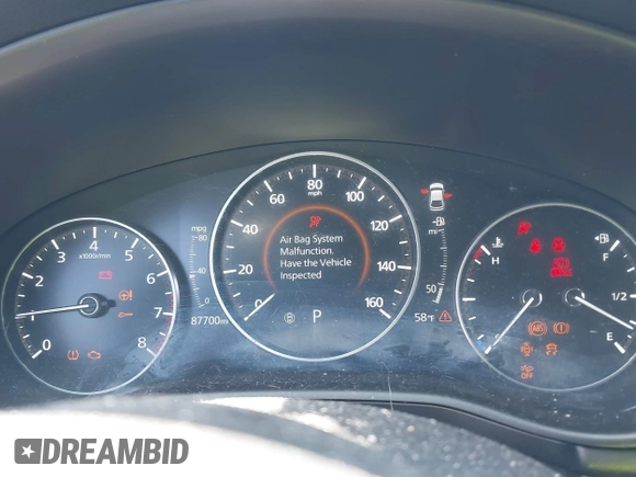 2021 Mazda 3 Select z VIN JM1BPAKL0M1321246, wystawiony jako IAAI lot #42031709 z przebiegiem 87 700 mil mil oraz . Historia ofert i sprzedaży dostępna na DreamBid. Obrazek 7.