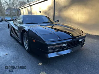 1988 Pontiac Fiero z VIN 1G2PE119XJP213392, wystawiony jako IAAI lot #41823168 z przebiegiem 71 246 mil mil oraz . Historia ofert i sprzedaży dostępna na DreamBid. Obrazek 1.