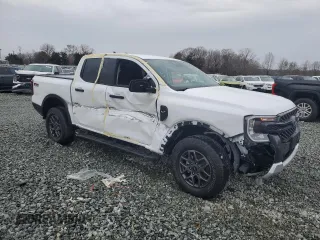 2024 Ford Ranger XLT with VIN 1FTER4HH9RLE29338, listed as a Copart auction lot 83814124 with 0 mi miles and Salvage Title. Bid and sale history available at carsss.com. Image 4.