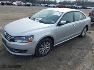 2015 Volkswagen Passat 1.8T S with VIN 1VWAT7A30FC013994, listed as a IAAI auction lot 41509741 with 85,328 mi miles. Bid and sale history available at carsss.com. Image 2.