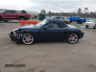 2003 Porsche Boxster S с VIN WP0CB29853U662035, выставлен на аукционе IAAI как лот 41845536 с пробегом 42 026 миль миль и . История ставок и продаж доступна на DreamBid. Изображение 14.
