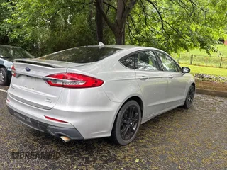 2019 Ford Fusion SE with VIN 3FA6P0HD3KR193220, listed as a Copart auction lot 56783795 with 112,949 mi miles and Clean Title. Bid and sale history available at DreamBid. Image 4.